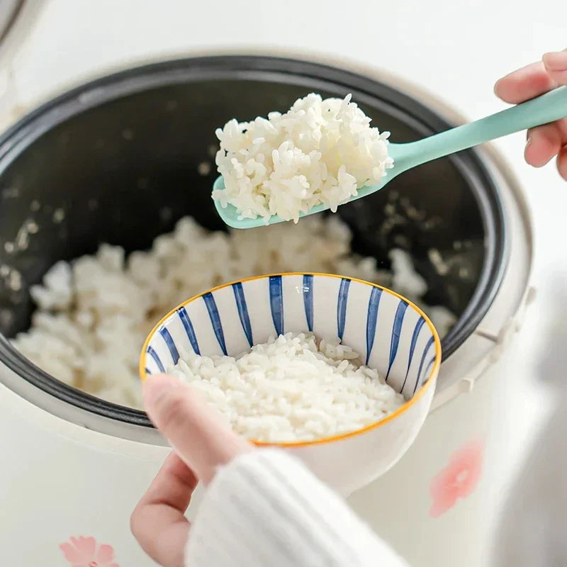 Chef Spatulas Red Person Holding Spoon Over Rice Bowl Spatula