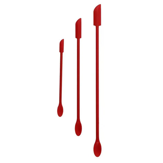Three red spatulas of varying sizes on a white background