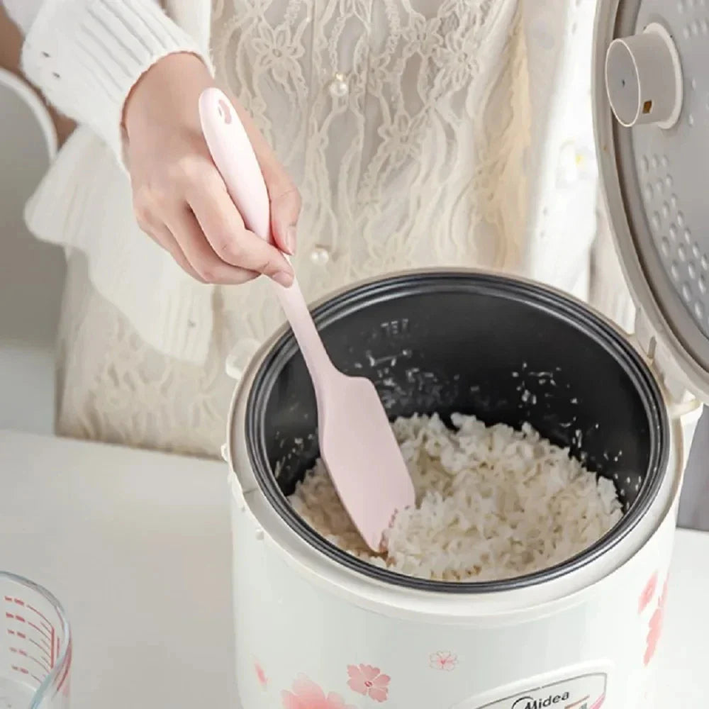 Chef Spatulas Red Woman Is Using Spoon To Stir Rice Cooker Spatula