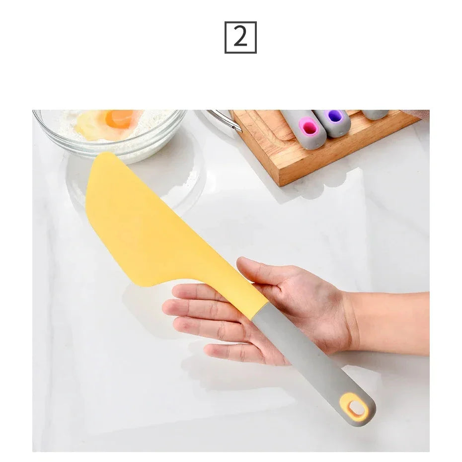 Chef Spatulas Yellow Person Holding Yellow Knife Spatula
